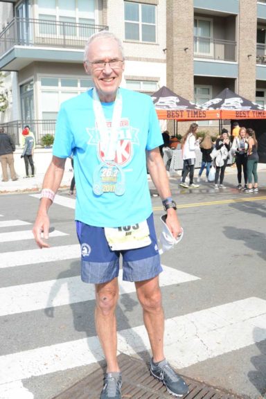 Runner wearing medal